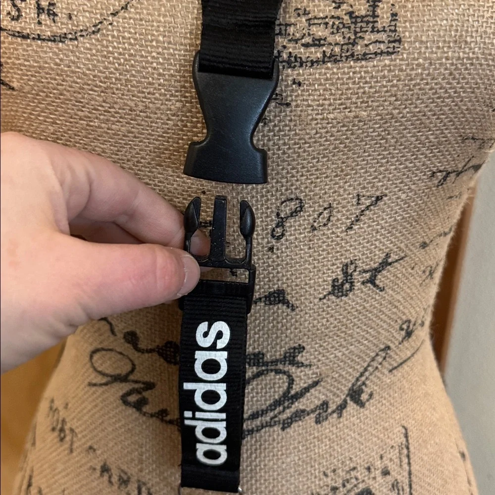 Barely used authentic ADIDAS lanyard with pinch clip off section on bottom.